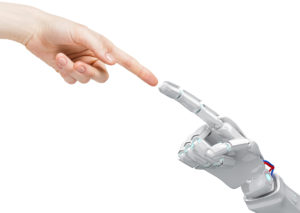 Ihmiskäsi ja robottikäsi koskettavat.