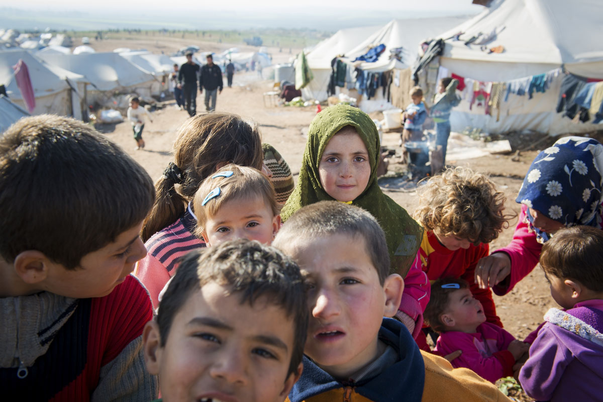 Syyrialaisia pakolaisia Atmehin leirillä Syyrian ja Turkin rajalla tammikuussa 2013.